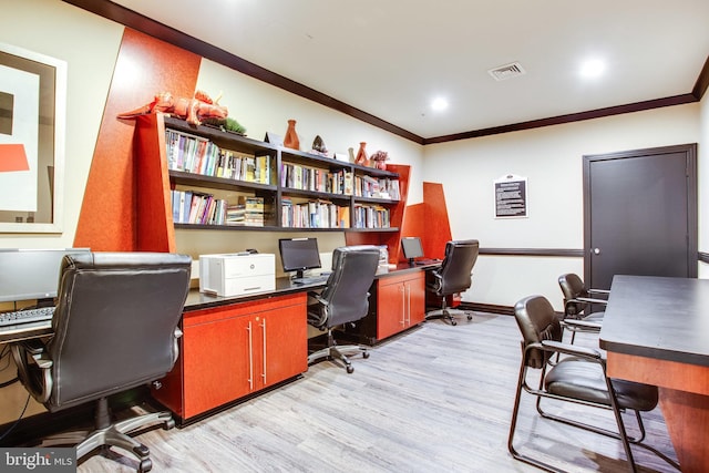 home office with visible vents, baseboards, light wood-type flooring, ornamental molding, and recessed lighting