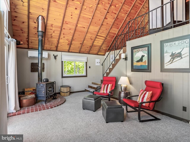 777 Timber Ln, Berkeley Springs, WV 25411 - living area with a wood stove, wooden ceiling, an AC wall unit, carpet, and stairs
