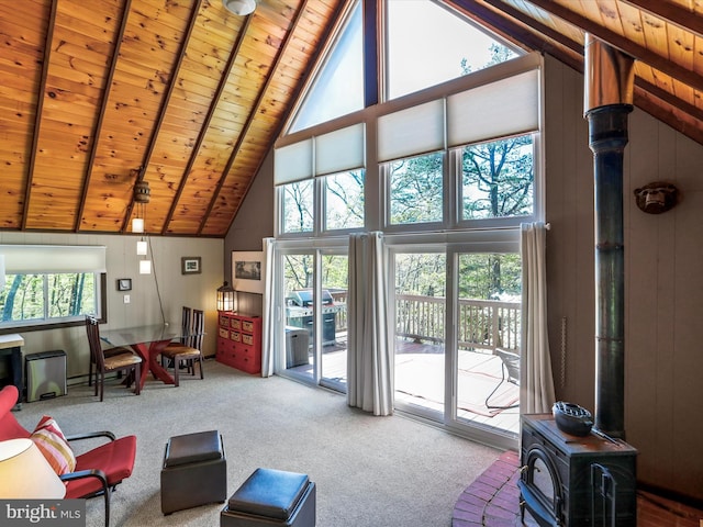 777 Timber Ln, Berkeley Springs, WV 25411 - living room featuring high vaulted ceiling, wooden ceiling, a healthy amount of sunlight, and carpet
