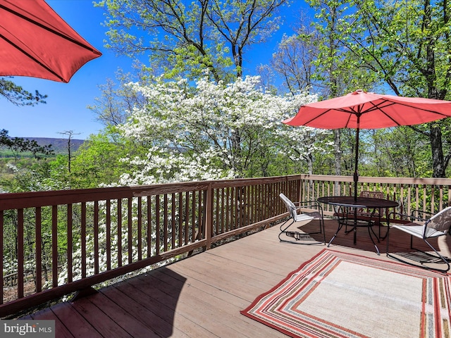 777 Timber Ln, Berkeley Springs, WV 25411 - wooden deck featuring outdoor dining area