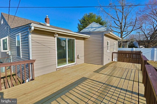 wooden deck featuring fence