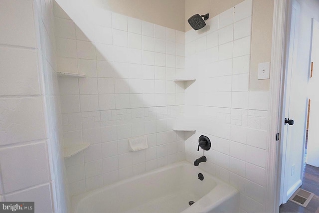 full bathroom with shower / tub combination