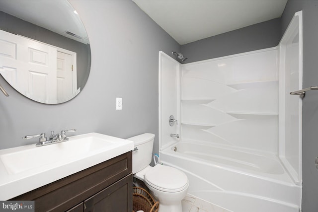 bathroom featuring visible vents, toilet, marble finish floor, shower / bathing tub combination, and vanity