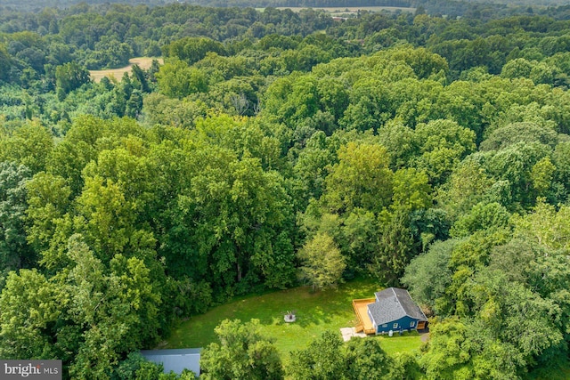 bird's eye view featuring a view of trees