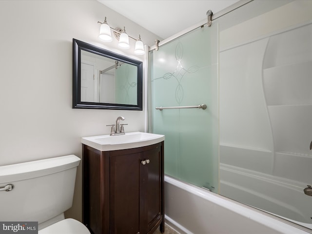 bathroom with toilet, vanity, and bath / shower combo with glass door