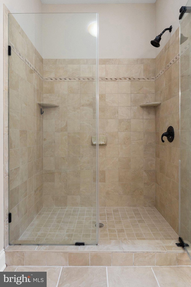 bathroom with a stall shower