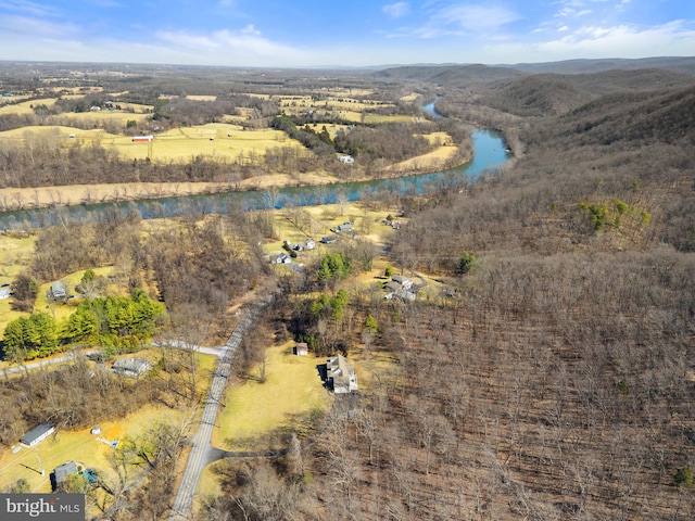 aerial view with a water and mountain view