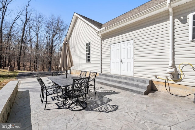 view of patio with outdoor dining area