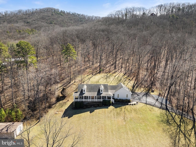 aerial view with a wooded view