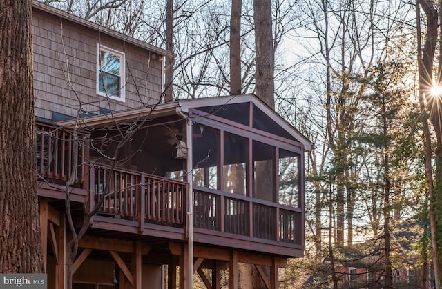 exterior space featuring a sunroom