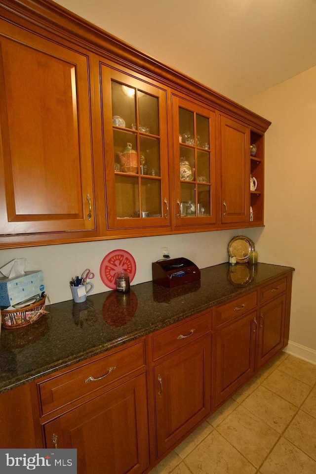 bar featuring light tile patterned flooring