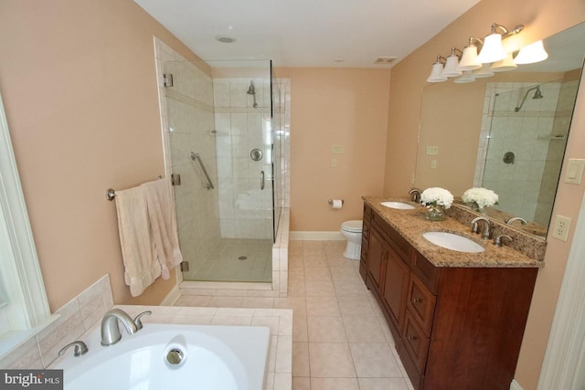 full bath with a sink, a washtub, a shower stall, and tile patterned floors