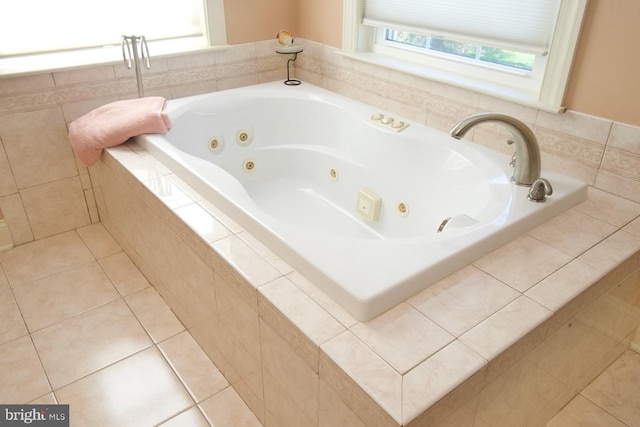 full bathroom with tile patterned flooring and a jetted tub