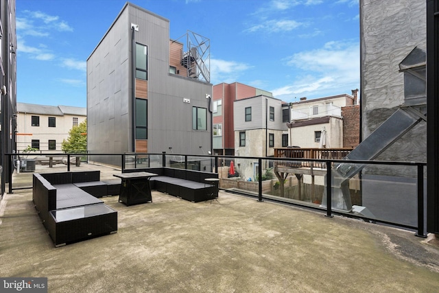 view of patio with a residential view and outdoor lounge area