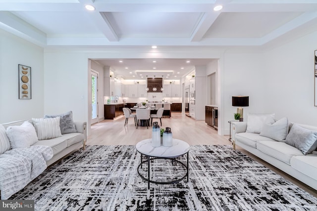 living area with recessed lighting, light wood-type flooring, beam ceiling, and coffered ceiling