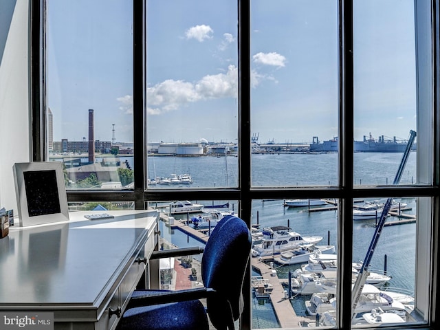 interior space featuring a city view and a water view