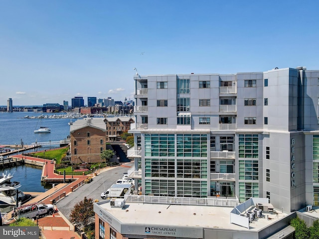 view of building exterior with a water view