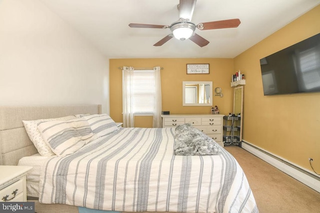 bedroom with ceiling fan, light carpet, and a baseboard radiator