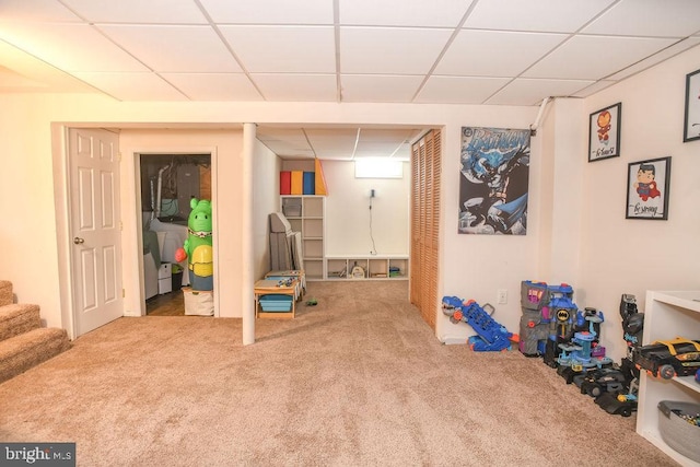 game room featuring a paneled ceiling and carpet floors