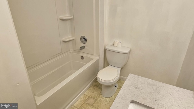 full bath featuring shower / bath combination, baseboards, and toilet