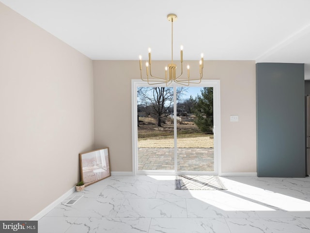 unfurnished dining area with visible vents, a notable chandelier, baseboards, and marble finish floor