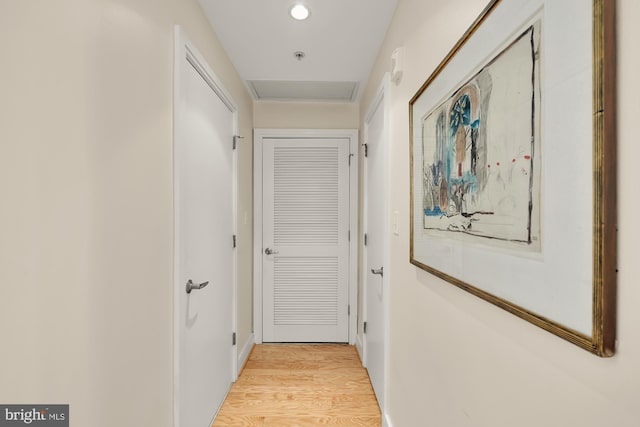 hallway with light wood-type flooring