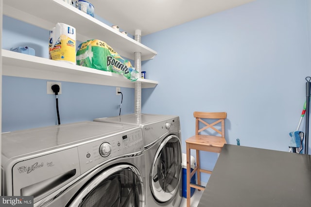 clothes washing area featuring laundry area and independent washer and dryer