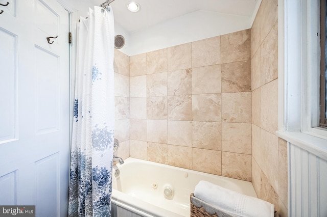 bathroom featuring a combined bath / shower with jetted tub