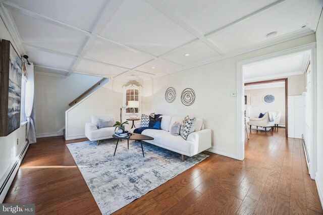 living area with hardwood / wood-style floors, stairs, coffered ceiling, and a baseboard radiator