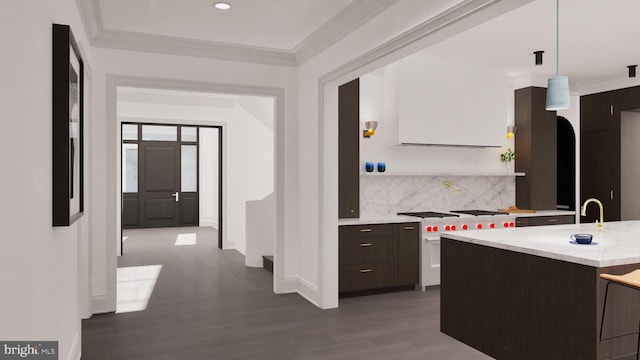 kitchen with dark wood finished floors, dark brown cabinetry, crown molding, modern cabinets, and backsplash