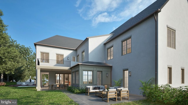 back of property featuring a balcony, an outdoor living space, a yard, stucco siding, and a patio area