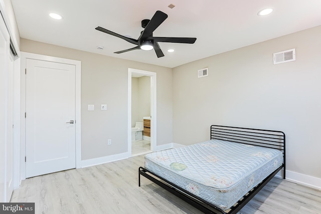 bedroom featuring baseboards, recessed lighting, visible vents, and light wood-style floors