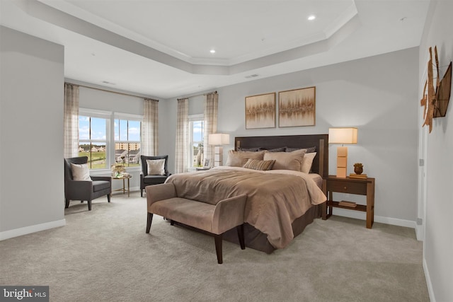 bedroom with light carpet, a raised ceiling, ornamental molding, recessed lighting, and baseboards