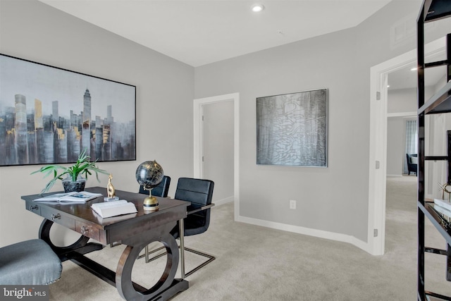 home office featuring recessed lighting, baseboards, and light carpet