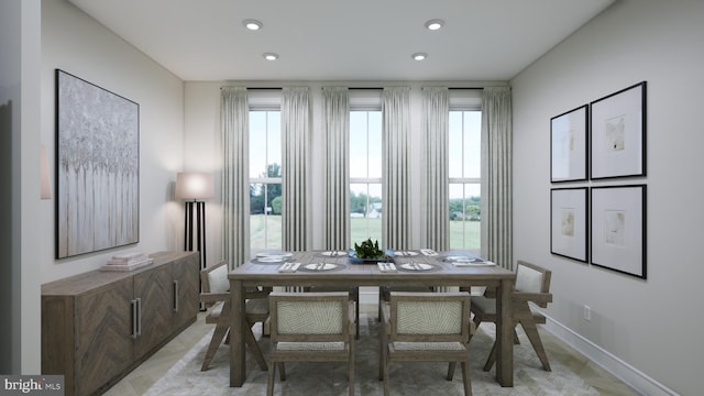 dining room featuring recessed lighting, baseboards, and a healthy amount of sunlight