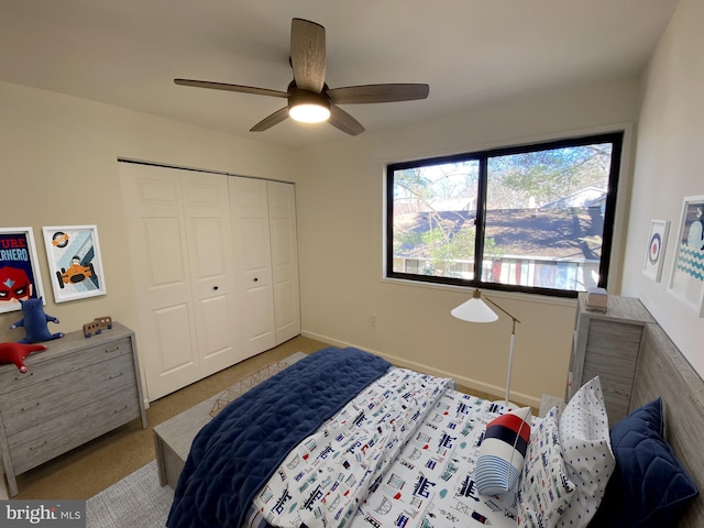 bedroom featuring a closet and ceiling fan