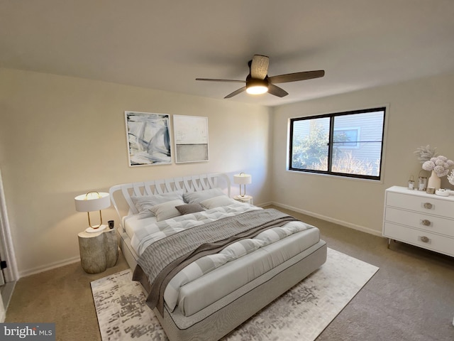 bedroom with carpet flooring, ceiling fan, and baseboards