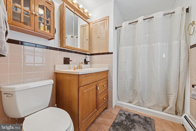 bathroom featuring toilet, a shower with shower curtain, tile walls, baseboard heating, and vanity