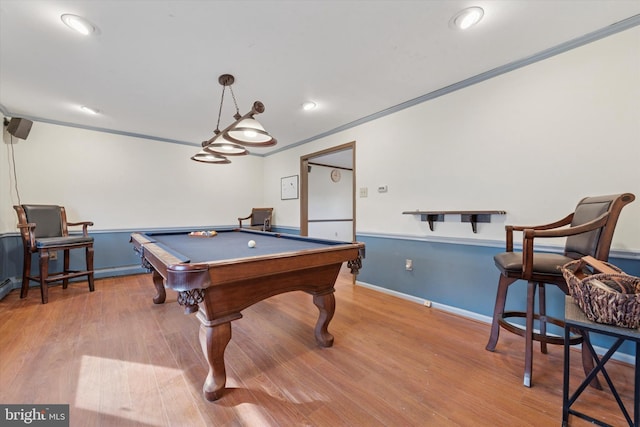 recreation room with ornamental molding, wood finished floors, recessed lighting, pool table, and baseboards