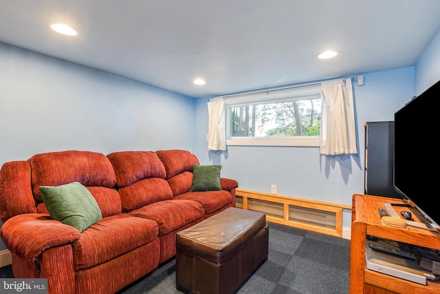 living area with carpet flooring, recessed lighting, and baseboards
