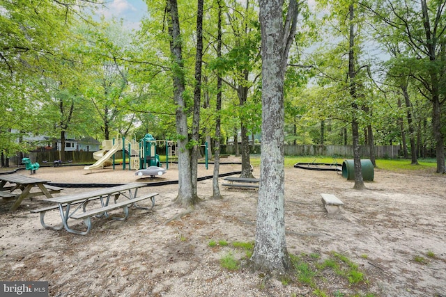 surrounding community with playground community and fence