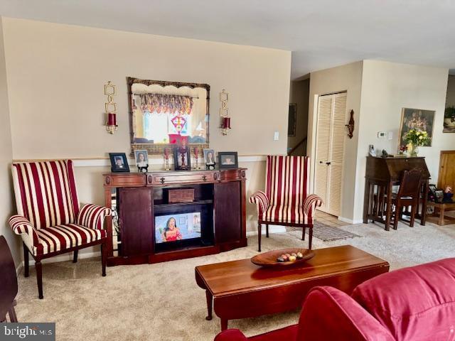 living room with carpet flooring