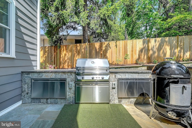 6813 Millwood Rd, Bethesda, MD 20817 - view of patio / terrace with a grill, area for grilling, and fence
