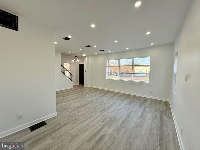 unfurnished living room featuring recessed lighting, visible vents, baseboards, and light wood-style flooring