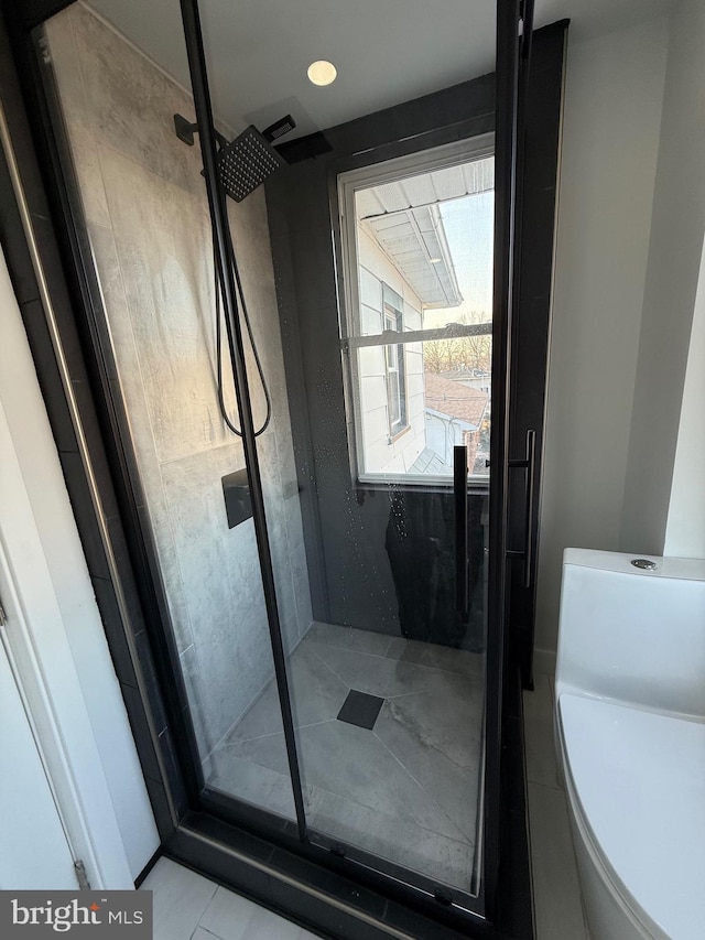 full bathroom featuring a shower stall