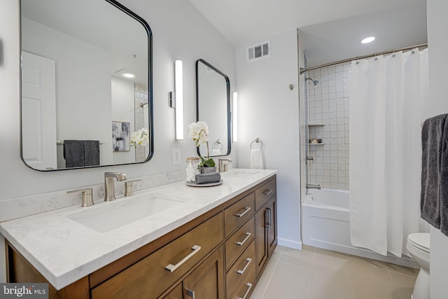 bathroom featuring a sink, visible vents, shower / bathtub combination with curtain, and toilet