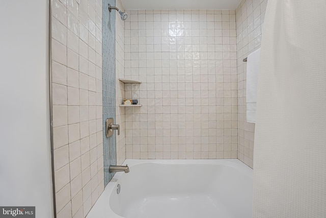 full bath featuring shower / bath combination with curtain