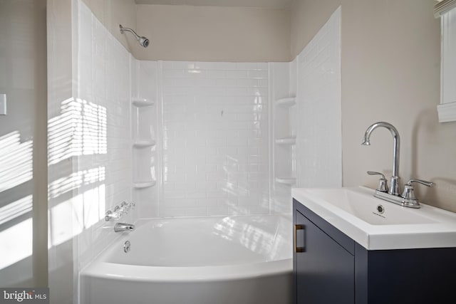 bathroom featuring vanity and washtub / shower combination