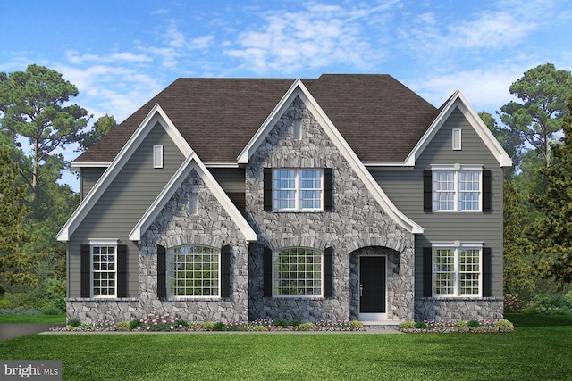 view of front of house featuring a front yard and a shingled roof