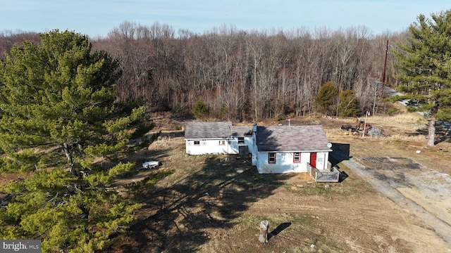 bird's eye view featuring a forest view